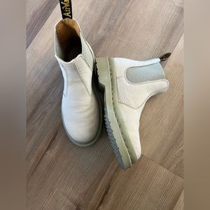 Dr. Marten cream nubuck leather boots.